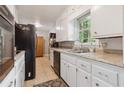Functional kitchen featuring sleek countertops and modern appliances at 3925 Chicamauga Ne Dr, Kennesaw, GA 30144