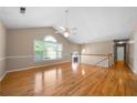Spacious living room with hardwood floors, high ceilings, and large windows at 4512 Terret Nw Trce, Acworth, GA 30101
