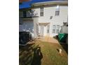 Back patio for outdoor relaxation and backyard access at 5897 Strathmoor Manor Cir, Lithonia, GA 30058