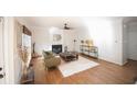 Spacious living room featuring a fireplace, hardwood floors and an area rug at 2019 Chelton Se Way, Smyrna, GA 30080