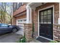 Inviting home entrance with stone facade and well-maintained landscaping at 5523 Glenridge Ne Park, Atlanta, GA 30342