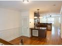 Open kitchen with stainless steel appliances and hardwood floors at 5523 Glenridge Ne Park, Atlanta, GA 30342