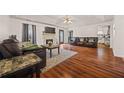 Large living room with hardwood floors, fireplace and lots of natural light at 1230 Brook Meadow Ct, Lawrenceville, GA 30045