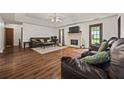 Spacious living room with high ceilings, fireplace, and hardwood floors at 1230 Brook Meadow Ct, Lawrenceville, GA 30045