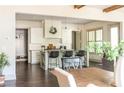 Modern kitchen with an island and bar stools at 4496 Sardis Church Rd, Buford, GA 30519