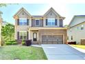 Beautiful two-story home with a well-maintained lawn, showcasing a welcoming exterior at 2272 Misty Brook Ct, Buford, GA 30519