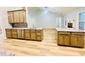 Bright kitchen with stainless steel appliances, granite countertops, and an inviting open-concept design at 7675 Lanier View Rdg, Cumming, GA 30041