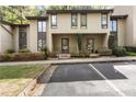 Two-story condos with well-maintained landscaping and ample parking at 72 Ivy Ne Pkwy, Atlanta, GA 30342