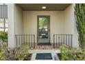Inviting front door with well-kept landscaping and brick porch at 72 Ivy Ne Pkwy, Atlanta, GA 30342