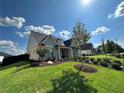 Beautiful lawn with young tree and professional landscaping on a sunny day at 3220 Montebello Pkwy, Cumming, GA 30028