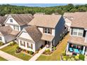 An aerial view of a beautiful home with a manicured lawn and lush greenery around the neighborhood at 637 Sunflower Dr, Canton, GA 30114
