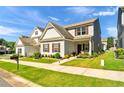 Beautiful home with manicured lawn and charming front porch at 637 Sunflower Dr, Canton, GA 30114