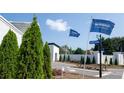 View of the entrance to the DR Horton new home community featuring a white brick wall and signage at 1518 Gatekeeper Ter, Marietta, GA 30066