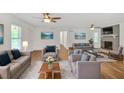 Spacious living area features hardwood floors, lots of seating, and abundant natural light, creating a warm atmosphere at 5306 Corinth Cir, Stone Mountain, GA 30087