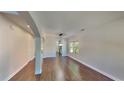 Open dining area with hardwood floors and a modern chandelier, perfect for entertaining at 1280 Sw Vonda Ln, Mableton, GA 30126
