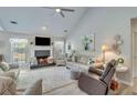 Bright living room featuring a fireplace, plush seating, and stylish decor at 1337 Highfield Dr, Lawrenceville, GA 30043