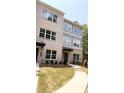 Beautiful two-story townhome with stylish brickwork and manicured landscaping at 5443 Blossomwood Sw Trl, Mableton, GA 30126