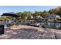 Inviting waterfront dock with seating and boat, great for enjoying the lake and outdoor living near the home at 10005 Lakeview Pkwy, Villa Rica, GA 30180