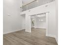 Spacious living area showcasing a coffered ceiling and open access to other living spaces at 7162 Linden Dr, South Fulton, GA 30349