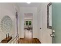 Inviting foyer showcasing hardwood floors, elegant decor, and an open view to the living room at 1460 Briarcliff Ne Rd, Atlanta, GA 30306