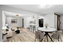 Bright and airy living space featuring modern finishes, open layout, updated lighting and stylish flooring at 2554 Gordon Se Cir, Smyrna, GA 30080