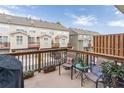 Comfortable patio with seating, plants, and an outdoor grill, perfect for relaxing at 4236 Tacoma Trce, Suwanee, GA 30024