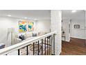 Bright and airy living room with comfortable seating and staircase at 802 Frederica Ne St # 5, Atlanta, GA 30306
