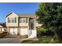 Charming two-story home featuring a two-car garage and well-maintained landscaping at 1501 Buckingham Pl, Stockbridge, GA 30281