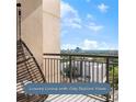 Relax on this spacious balcony with a comfortable egg chair and panoramic city views at 325 E Paces Ferry Ne Rd # 1803, Atlanta, GA 30305