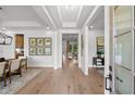 Bright entryway with hardwood floors, white trim and neutral walls creates an inviting and open living space at 313 Brooke View Trl, Canton, GA 30115