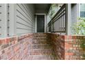 Charming front porch showcasing brick steps and classic architectural details at 2901 Ne Lenox Rd # 305, Atlanta, GA 30324