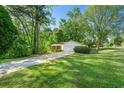 Charming home with a brick facade, white garage, and lush green lawn at 2254 Lisbon Ln, Jonesboro, GA 30236