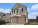 Charming two-story home featuring a two-car garage and neutral siding under a bright blue sky at 4044 Elsdon Dr, Austell, GA 30106