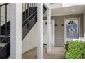 Townhome entrance with multiple doors and a staircase leading to the upper floors at 111 Fair Haven Se Way, Smyrna, GA 30080