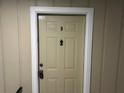 Condo unit door with security features and clear numbering for easy identification at 5147 Roswell Rd # 9, Atlanta, GA 30342