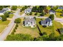 Aerial view of a house with a large backyard and a neighborhood setting at 6955 Pompas Ct, Douglasville, GA 30135