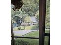 Scenic view from the window showcasing the well-maintained front yard and neighborhood at 502 S Evelyn Nw Pl, Atlanta, GA 30318