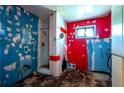 Incomplete bathroom with colorful walls and a step in shower at 1098 Cown Rd, Villa Rica, GA 30180