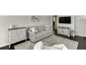 Cozy living room with elegant furniture and dark hardwood flooring at 2982 Ringle Rd, Brookhaven, GA 30341