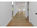 Bright hallway featuring a light-toned floor that flows into the home's spacious layout at 1408 Campbell Rd, Covington, GA 30014