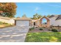 Charming single-story home featuring brick accents, manicured landscaping, and attached two-car garage at 2416 Centennial Hill Nw Way, Acworth, GA 30102