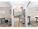 Inviting entryway with views of the living room and a staircase at 4440 Spring Mtn Ln, Powder Springs, GA 30127