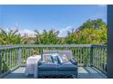 Relaxing balcony featuring outdoor seating and a view of the surrounding greenery at 230 Woodward Se Ave, Atlanta, GA 30312