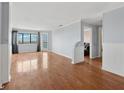 Bright living area with hardwood floors, and access to a balcony with a view at 795 Hammond Dr # 2101, Atlanta, GA 30328