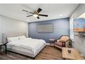 Comfortable bedroom featuring hardwood floors, soft lighting, and a relaxing ambiance at 2015 Cascade Sw Rd, Atlanta, GA 30311