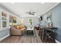 Cozy living room featuring hardwood floors, natural light, and a comfortable seating area perfect for relaxing at 2015 Cascade Sw Rd, Atlanta, GA 30311