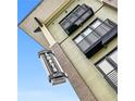 Low angle view of building with stylish architecture and signage against a blue sky at 5300 Peachtree Rd # 3601, Atlanta, GA 30341