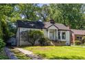 Charming single-story home with a welcoming front entrance and well-maintained landscaping at 536 Trabert Nw Ave, Atlanta, GA 30309