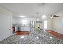 Modern kitchen features a large island, stainless steel appliances, and ample counter space at 3009 Bruce Nw Ct, Acworth, GA 30101