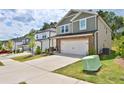 Beautiful two-story home with brick accents and a two-car garage in a well-maintained neighborhood at 311 Wells Cir, Canton, GA 30114